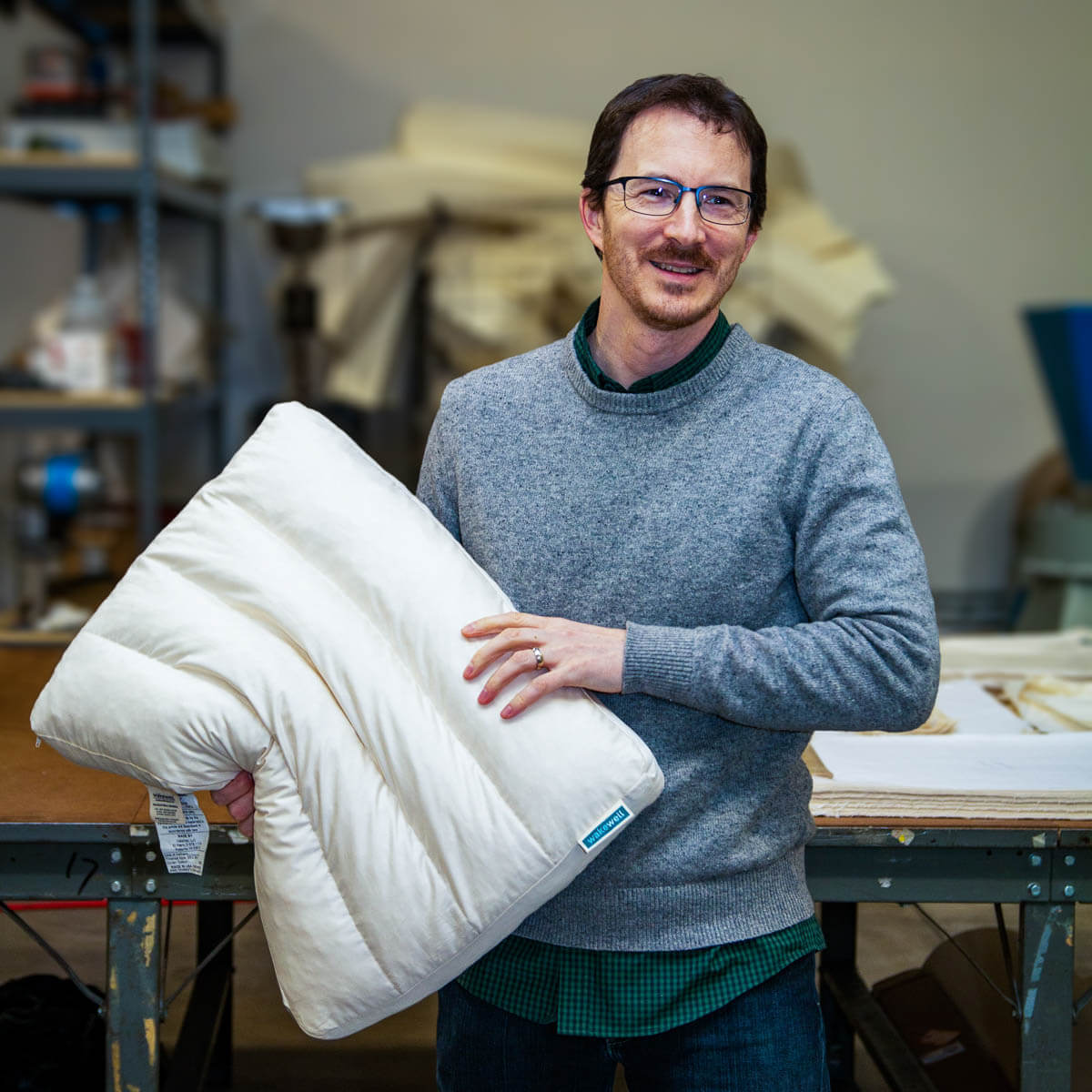 Picture of WakeWell Founder Ryan Del Balso with a WakeWell Pillow. March 2020